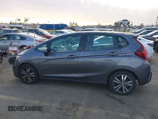 2015 Honda Fit LX with VIN 3HGGK5H5XFM719477, listed as a IAAI auction lot 41671194 with 145,876 mi miles. Bid and sale history available at carsss.com. Image 14.