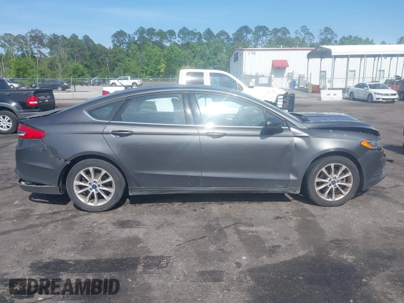 2017 Ford Fusion SE z VIN 3FA6P0H76HR259097, wystawiony jako IAAI lot #42133090 z przebiegiem 187 400 mil mil oraz . Historia ofert i sprzedaży dostępna na DreamBid. Obrazek 13.