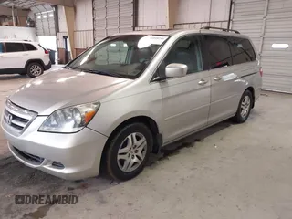2006 Honda Odyssey EX-L z VIN 5FNRL38746B461357, wystawiony jako IAAI lot #41040746 z przebiegiem 256 047 mil mil oraz . Historia ofert i sprzedaży dostępna na DreamBid. Obrazek 2.