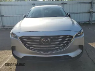 2018 Mazda CX-9 Touring z VIN JM3TCACY4J0219449, wystawiony jako Copart lot #61949725 z przebiegiem 134 904 mil mil oraz Czysty tytuł • Clean title. Historia ofert i sprzedaży dostępna na DreamBid. Obrazek 5.