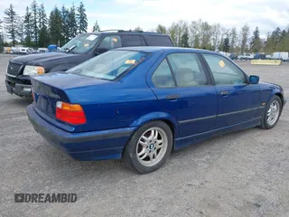 1998 BMW 3 Series 328iA with VIN WBACD4325WAV64684, listed as a IAAI auction lot 42032472 with 240,264 mi miles. Bid and sale history available at carsss.com. Image 4.