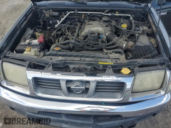 1999 Nissan Frontier XE z VIN 1N6ED26Y2XC301913, wystawiony jako Copart lot #53152165 z przebiegiem 271 272 mil mil oraz Szkoda całkowita • Salvage title. Historia ofert i sprzedaży dostępna na DreamBid. Obrazek 11.