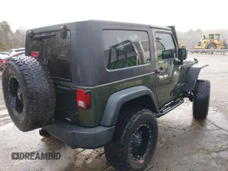 2009 Jeep Wrangler Rubicon z VIN 1J8GA64169L743008, wystawiony jako IAAI lot #41792451 z przebiegiem 142 414 mil mil oraz . Historia ofert i sprzedaży dostępna na DreamBid. Obrazek 4.