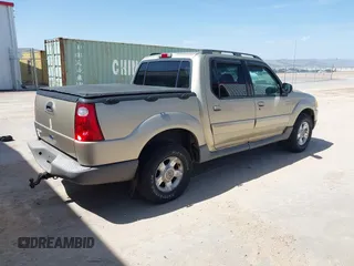 2001 Ford Explorer Sport Trac z VIN 1FMZU67E61UC47965, wystawiony jako IAAI lot #41984123 z przebiegiem 206 982 mil mil oraz . Historia ofert i sprzedaży dostępna na DreamBid. Obrazek 4.