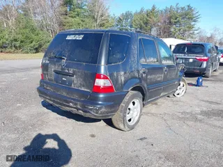 2003 Mercedes-Benz M-Class 3.7L with VIN 4JGAB57E23A450868, listed as a IAAI auction lot 41983681 with 125,468 mi miles. Bid and sale history available at carsss.com. Image 4.