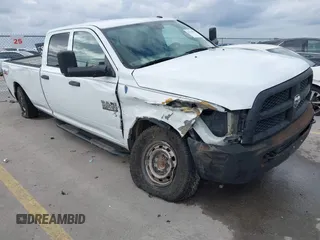 2013 Ram 2500 Tradesman z VIN 3C6TR5HTXDG578274, wystawiony jako IAAI lot #41119075 z przebiegiem 110 825 mil mil oraz . Historia ofert i sprzedaży dostępna na DreamBid. Obrazek 1.