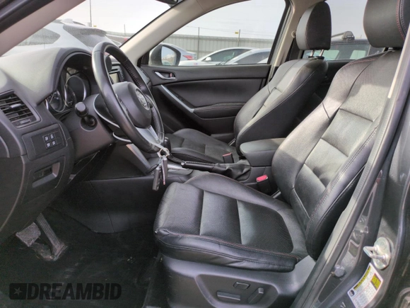 2015 Mazda CX-5 Grand Touring with VIN JM3KE4DY3F0495411, listed as a Copart auction lot 50077765 with 136,191 mi miles and Salvage Title. Bid and sale history available at DreamBid. Image 7.