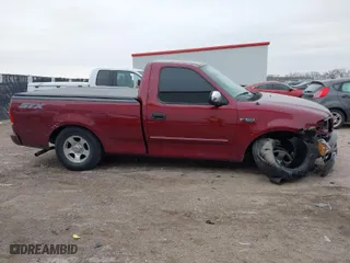 2004 Ford F-150 Heritage XL with VIN 2FTRF17204CA08424, listed as a IAAI auction lot 41588440 with 197,523 mi miles. Bid and sale history available at carsss.com. Image 13.