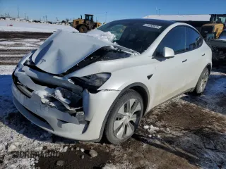 2022 Tesla Model Y Long Range z VIN 7SAYGDEE1NA009664, wystawiony jako Copart lot #41533925 z przebiegiem 36 126 mil mil oraz Szkody całkowita. Historia ofert i sprzedaży dostępna na DreamBid. Obrazek 1.