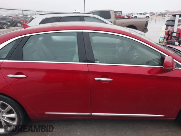 2013 Cadillac XTS Luxury with VIN 2G61P5S32D9115640, listed as a IAAI auction lot 41065284 with 125,643 mi miles and . Bid and sale history available at carsss.com. Image 13.