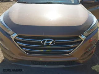 2016 Hyundai Tucson Sport with VIN KM8J33A20GU211615, listed as a IAAI auction lot 41685718 with 97,458 mi miles. Bid and sale history available at carsss.com. Image 6.