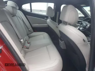 2023 Genesis G70 2.0T with VIN KMTG34TA6PU132041, listed as a Copart auction lot 82761074 with 33,317 mi miles and Salvage Title. Bid and sale history available at DreamBid. Image 10.