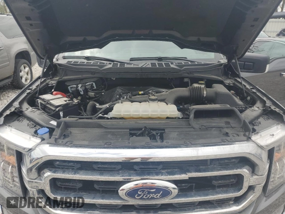 2023 Ford F-150 XL with VIN 1FTEW1EP8PKF20042, listed as a Copart auction lot 55163335 with 26,870 mi miles and Salvage title. Bid and sale history available at DreamBid. Image 11.