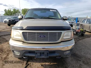 2000 Ford F-150 XL with VIN 1FTRF18L9YKA95457, listed as a Copart auction lot 67083164 with 97,988 mi miles and Salvage title. Bid and sale history available at DreamBid. Image 5.