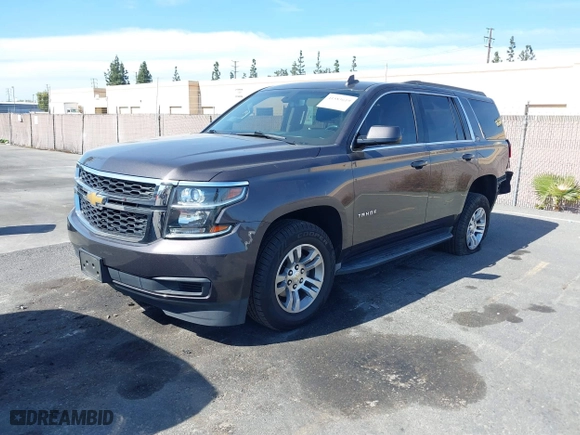 2016 Chevrolet Tahoe LS with VIN 1GNSCAKC2GR110249, listed as a IAAI auction lot 41583619 with 65,542 mi miles. Bid and sale history available at carsss.com. Image 2.