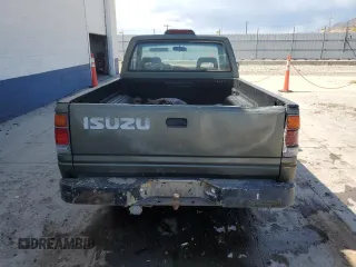 1994 Isuzu Pickup S z VIN JAACL11L2R7221226, wystawiony jako Copart lot #59027295 z przebiegiem 129 494 mil mil oraz Tytuł czysty. Historia ofert i sprzedaży dostępna na DreamBid. Obrazek 6.