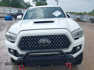 2019 Toyota Tacoma SR z VIN 3TMCZ5AN0KM232852, wystawiony jako IAAI lot #42178269 z przebiegiem 71 545 mil mil oraz . Historia ofert i sprzedaży dostępna na DreamBid. Obrazek 12.