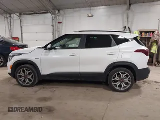 2021 Kia Seltos S with VIN KNDEUCA24M7104385, listed as a IAAI auction lot 40663983 with 51,290 mi miles. Bid and sale history available at carsss.com. Image 14.