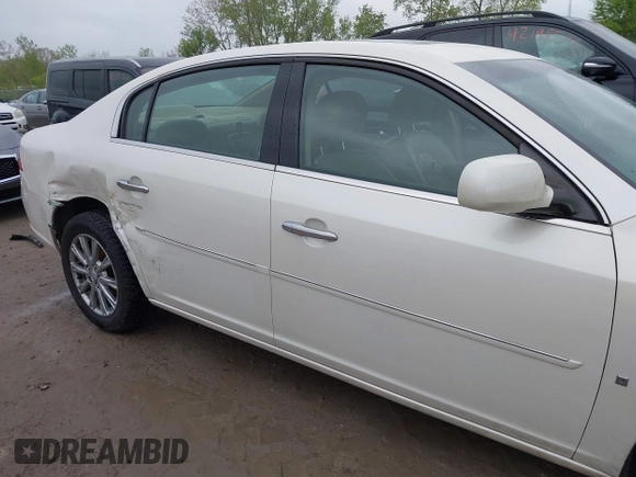 2009 Buick Lucerne CXL with VIN 1G4HD57M19U147653, listed as a IAAI auction lot 42166780 with 84,794 mi miles and . Bid and sale history available at DreamBid. Image 13.