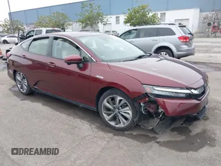 2018 Honda Clarity Plug-In Hybrid with VIN JHMZC5F11JC008277, listed as a IAAI auction lot 41561940 with 76,146 mi miles. Bid and sale history available at carsss.com. Image 1.