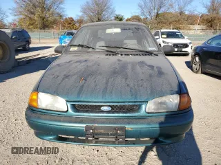1996 Ford Aspire z VIN KNJLT06H0T6195551, wystawiony jako Copart lot #79450694 z przebiegiem 887 992 mil mil oraz Tytuł czysty. Historia ofert i sprzedaży dostępna na DreamBid. Obrazek 5.