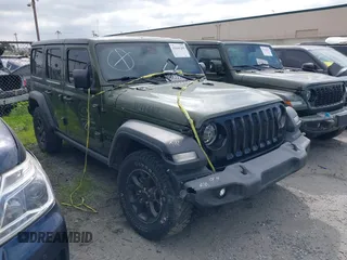 2020 Jeep Wrangler Unlimited Sport S with VIN 1C4HJXDG6LW285952, listed as a IAAI auction lot 41666200 with 37,089 mi miles and . Bid and sale history available at DreamBid. Image 1.