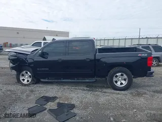 2017 Chevrolet Silverado 1500 LT with VIN 3GCUKREC9HG374973, listed as a IAAI auction lot 41423560 with 141,661 mi miles. Bid and sale history available at carsss.com. Image 14.