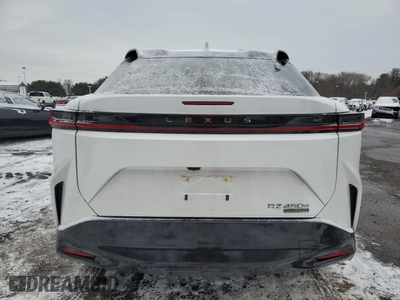 2024 Lexus RZ 450e Premium z VIN JTJAAAABXRA025712, wystawiony jako Copart lot #86183394 z przebiegiem 3 799 mil mil oraz Szkoda całkowita • Salvage title. Historia ofert i sprzedaży dostępna na DreamBid. Obrazek 6.