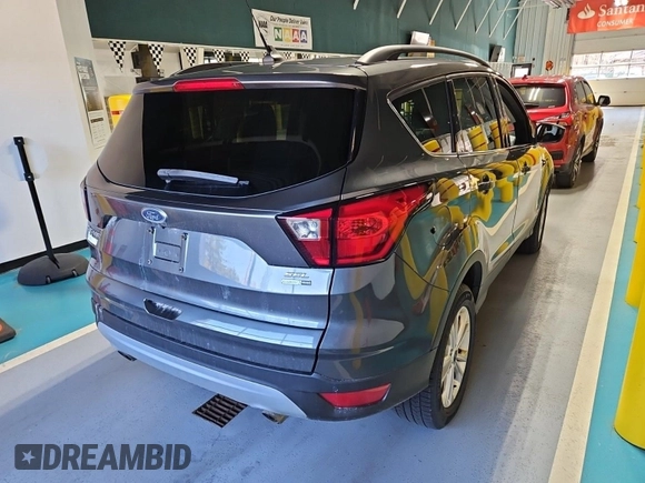 2019 Ford Escape SEL with VIN 1FMCU9HD5KUA48176, listed as a IAAI auction lot 42229622 with 80,176 mi miles and . Bid and sale history available at DreamBid. Image 22.