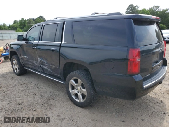 2015 Chevrolet Suburban LTZ with VIN 1GNSKKKC1FR624679, listed as a Copart auction lot 52957365 with 71,194 mi miles and Salvage Title. Bid and sale history available at DreamBid. Image 2.