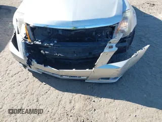 2013 Cadillac CTS Premium with VIN 1G6DP5E33D0175817, listed as a IAAI auction lot 41882197 with 116,645 mi miles and . Bid and sale history available at DreamBid. Image 6.
