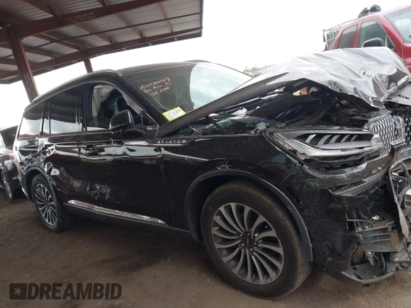 2024 Lincoln Aviator Reserve z VIN 5LM5J7WC2RGL05445, wystawiony jako IAAI lot #42184539 z przebiegiem 68 616 mil mil oraz . Historia ofert i sprzedaży dostępna na DreamBid. Obrazek 13.