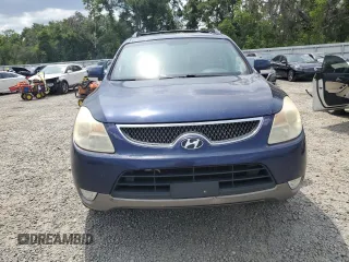 2010 Hyundai Veracruz Limited z VIN KM8NU4CC0AU137341, wystawiony jako Copart lot #55654815 z przebiegiem 195 996 mil mil oraz Nie do naprawy. Historia ofert i sprzedaży dostępna na DreamBid. Obrazek 5.