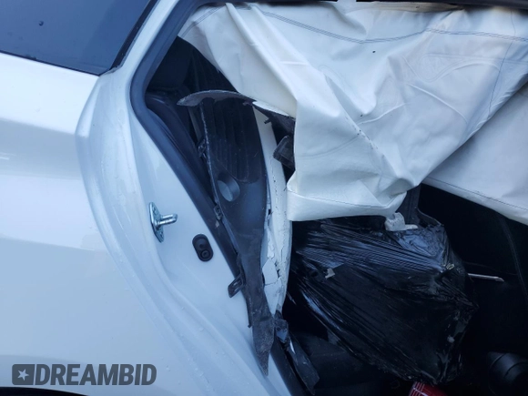 2021 Toyota Prius LE z VIN JTDL9MFU9M3022975, wystawiony jako Copart lot #53810615 z przebiegiem Nie podano mil oraz Nie do naprawy • Non repairable. Historia ofert i sprzedaży dostępna na DreamBid. Obrazek 13.