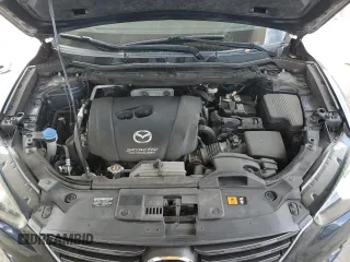2016 Mazda CX-5 Touring with VIN JM3KE2CY9G0834048, listed as a Copart auction lot 54491535 with 116,328 mi miles and Salvage Title. Bid and sale history available at DreamBid. Image 12.