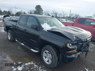 2018 Chevrolet Silverado 1500 LT with VIN 1GCVKREC1JZ349561, listed as a IAAI auction lot 41277292 with 102,525 mi miles and . Bid and sale history available at DreamBid. Image 1.