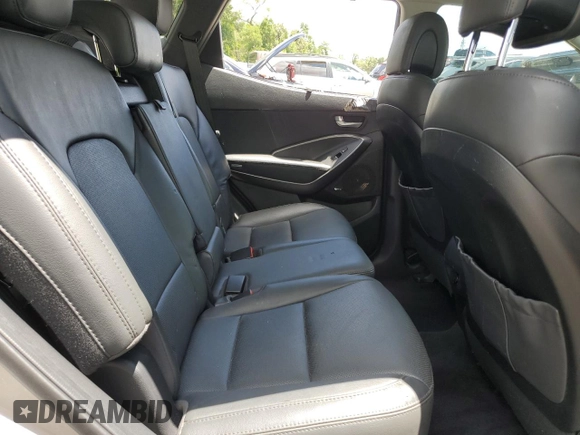 2017 Hyundai Santa Fe Ultimate z VIN 5XYZW4LA8HG491652, wystawiony jako Copart lot #56907985 z przebiegiem Nie podano mil oraz Szkoda całkowita • Salvage title. Historia ofert i sprzedaży dostępna na DreamBid. Obrazek 11.