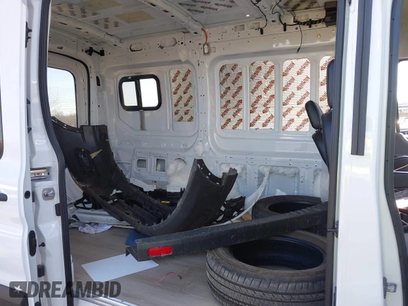 2023 Ford Transit z VIN 1FTYE2C84PKB90935, wystawiony jako IAAI lot #41649489 z przebiegiem 3 272 mil mil oraz . Historia ofert i sprzedaży dostępna na DreamBid. Obrazek 8.