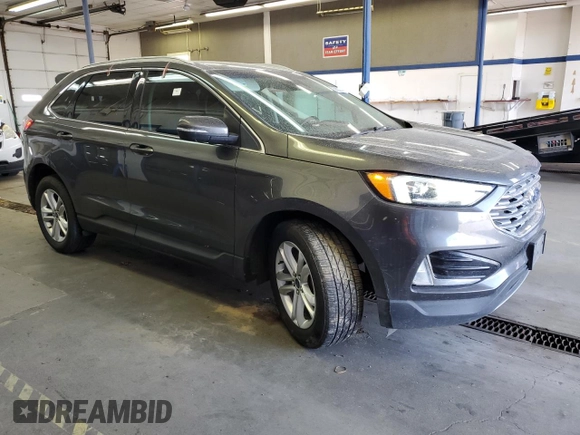 2019 Ford Edge SEL with VIN 2FMPK4J95KBB76844, listed as a Copart auction lot 59323925 with 122,326 mi miles and Salvage title. Bid and sale history available at DreamBid. Image 4.