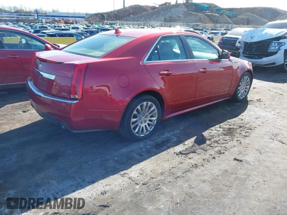 2011 Cadillac CTS Premium with VIN 1G6DS5ED7B0133154, listed as a IAAI auction lot 41822033 with 121,862 mi miles. Bid and sale history available at carsss.com. Image 4.