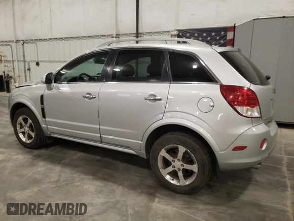 2012 Chevrolet Captiva Sport LTZ with VIN 3GNFL4E5XCS609095, listed as a Copart auction lot 77334734 with 163,078 mi miles and Salvage Title. Bid and sale history available at DreamBid. Image 2.