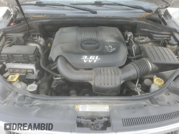 2012 Jeep Grand Cherokee Laredo with VIN 1C4RJEAG3CC259758, listed as a Copart auction lot 51514765 with 196,189 mi miles and Salvage Title. Bid and sale history available at carsss.com. Image 13.