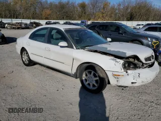 2002 Mercury Sable GS with VIN 1MEFM50U22G649595, listed as a Copart auction lot 82241114 with 210,635 mi miles and Salvage Title. Bid and sale history available at DreamBid. Image 4.