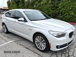 2016 BMW 5 Series 535i Gran Turismo with VIN WBA5M2C5XGG499062, listed as a Copart auction lot 57152915 with 98,470 mi miles and Salvage title. Bid and sale history available at DreamBid. Image 1.