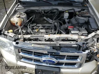 2011 Ford Escape XLT z VIN 1FMCU9D7XBKA96400, wystawiony jako Copart lot #53159585 z przebiegiem 119 962 mil mil oraz Czysty tytuł • Clean title. Historia ofert i sprzedaży dostępna na DreamBid. Obrazek 11.