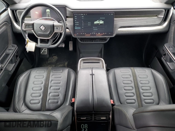 2022 Rivian R1T Adventure z VIN 7FCTGAAA9NN014280, wystawiony jako Copart lot #49723355 z przebiegiem 28 601 mil mil oraz Szkody całkowita. Historia ofert i sprzedaży dostępna na DreamBid. Obrazek 8.