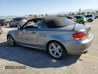 2012 BMW 1 Series 128i with VIN WBAUN1C5XCVR00151, listed as a Copart auction lot 56040445 with 171,302 mi miles and Salvage title. Bid and sale history available at DreamBid. Image 2.