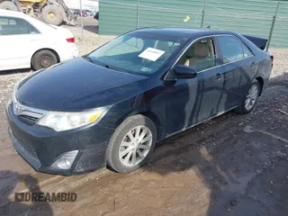 2014 Toyota Camry SE with VIN 4T1BK1FK3EU537670, listed as a IAAI auction lot 41649097 with 64,636 mi miles. Bid and sale history available at carsss.com. Image 2.