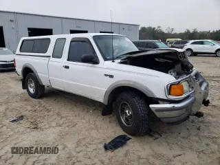 1996 Ford Ranger XLT with VIN 1FTCR15X7TPA63056, listed as a Copart auction lot 86500854 with 239,185 mi miles and Salvage Title. Bid and sale history available at DreamBid. Image 4.