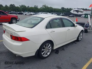 2007 Acura TSX with VIN JH4CL96817C004877, listed as a IAAI auction lot 42464309 with 299,459 mi miles and . Bid and sale history available at DreamBid. Image 4.